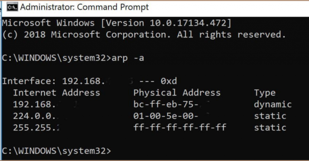 Screenshot of Windows Command Prompt displaying ARP cache entries using the arp -a command with IP addresses, MAC addresses, and connection types.